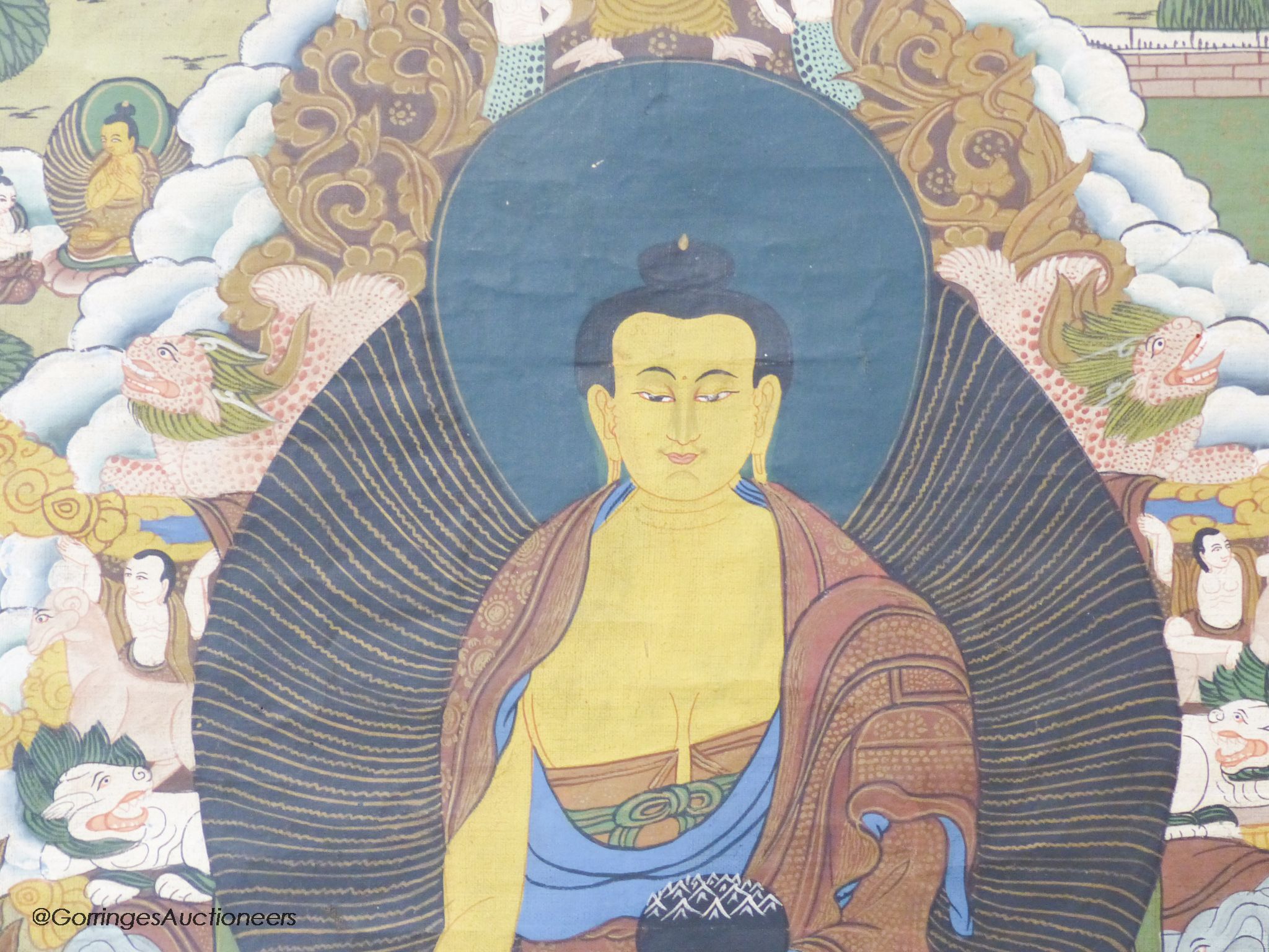 A thangka, 82 x 57cm excluding green backing cloth